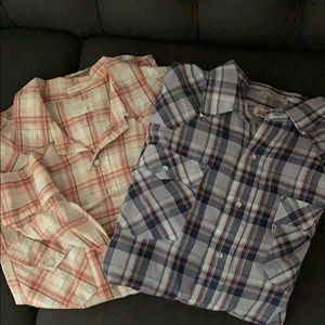 Bundle of two men’s collared shirts.